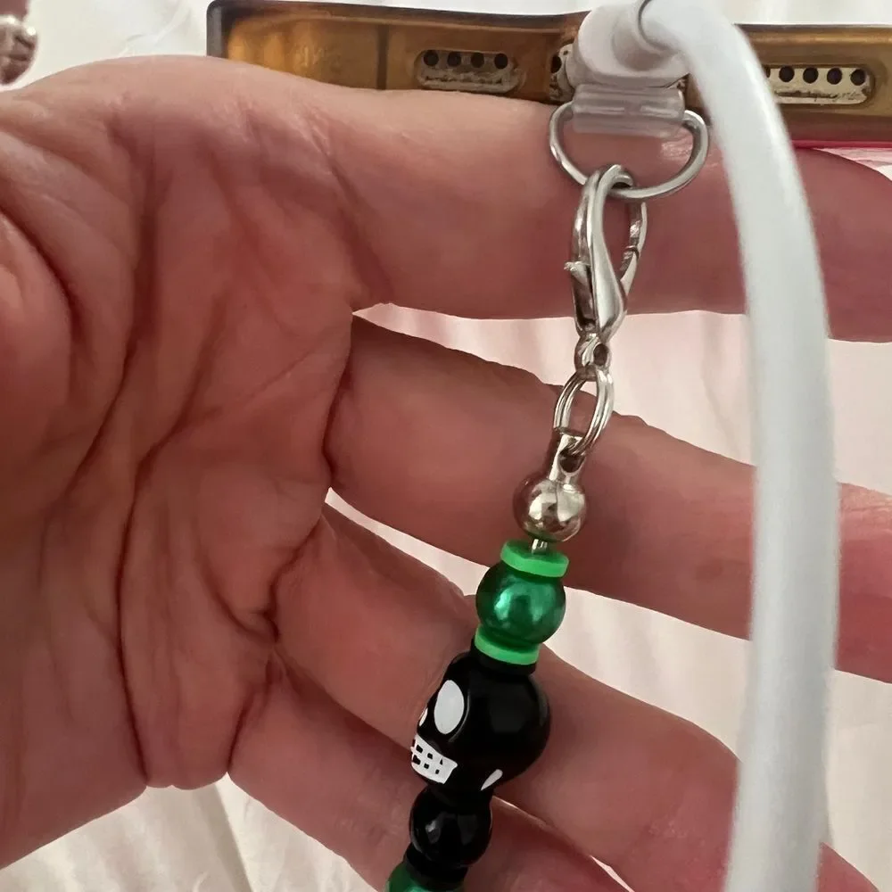 NWT one of a kind Angelas Designs black and purple skull cell phone charm